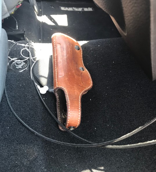 Most workers feel a need to be armed so close to Mexican cartel operatives as this empty holster on the floorboard of a vehicle attests