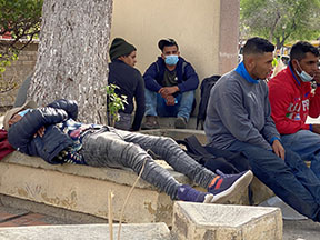 Migrants resting after being returned to Acuna Mexico by the Border Patrol