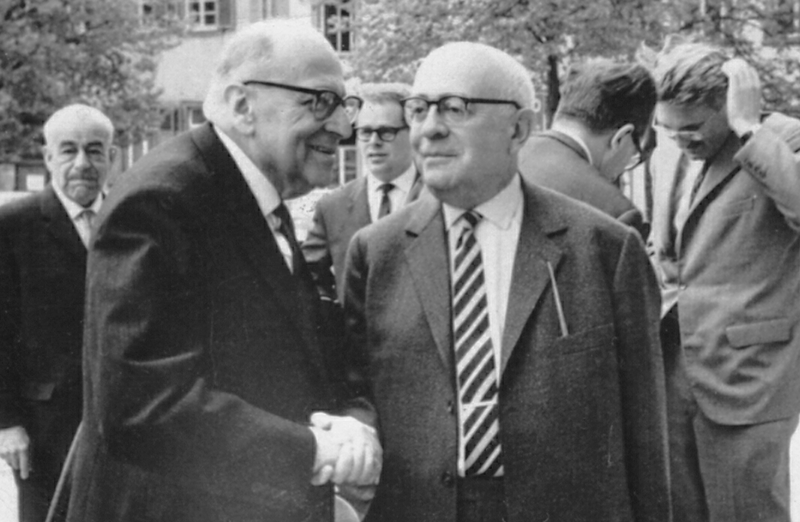 Max Horkheimer is front left, Theodor Adorno is front right, and Jurgen Habermas is in the background, running his hand through his hair. Photograph by Jeremy J. Shapiro, Heidelberg, April 1964.