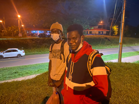 Two Senegalese immigrants in Los Chiles negotiating with a smuggler 