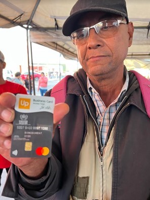 A Nicaraguan on his way to the US showed his UN cash card in Monterrey, Mexico